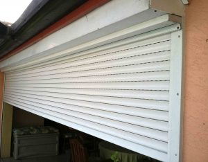 Storm shutters on a finished house built in Naples